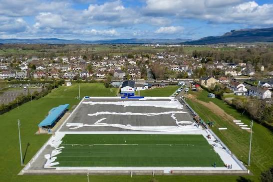 The new 3G carpet being rolled out across The Showgrounds pitch